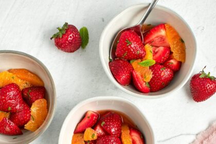 orange and strawberry salad in bowls