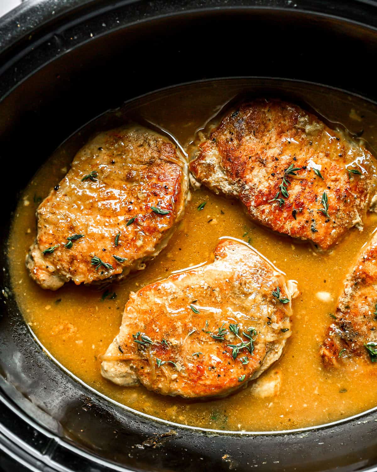 pork chops in gravy in a slow cooker.