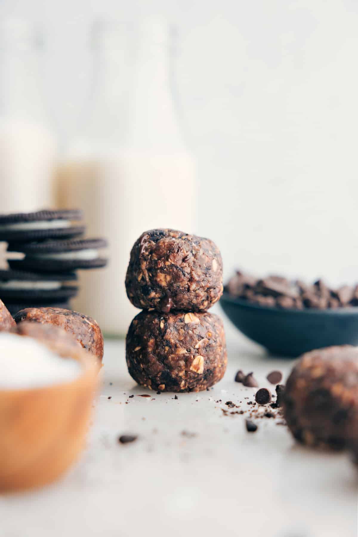 Cookies & Cream Energy Bites stacked on top of each other, ready to be enjoyed.