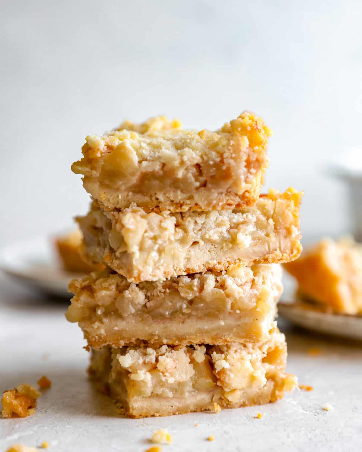 4 stacked apple pie bars.