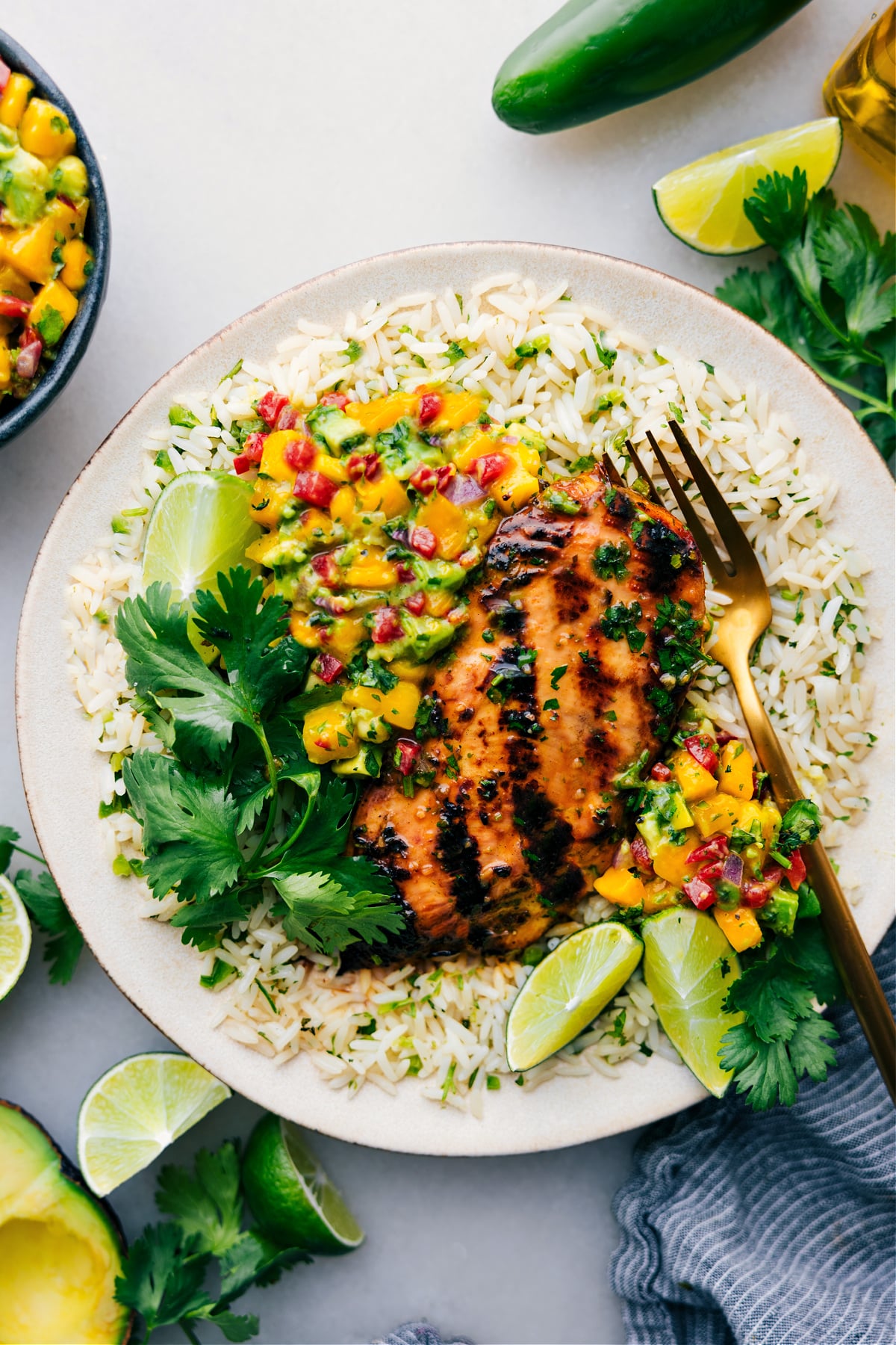 Cilantro Lime Chicken on a bed of rice with fresh salsa.