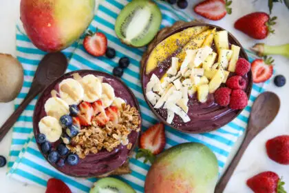 acai bowls topped with tropical fruit