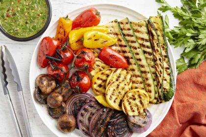 Overhead view of a plate of grilled vegetables.