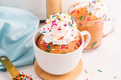 Air Fryer Funfetti Mug Cake with whipped topping
