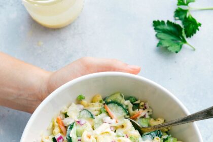 Macaroni Coleslaw Salad recipe in a bowl ready to be enjoyed.