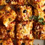 Dinner roll sheet pan pizza slices.