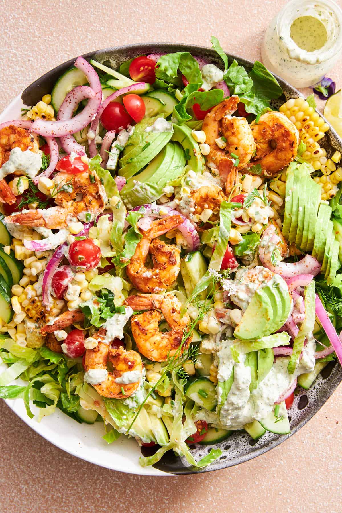 A bowl of shrimp avocado salad.