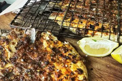 Mediterranean grilled fish on a serving platter.