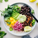 Chicken Rice Bowl in a bowl with all the delicious toppings.