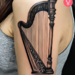 8 Harfen-Tattoo-Ideen, die die Eleganz der Musik einfangen