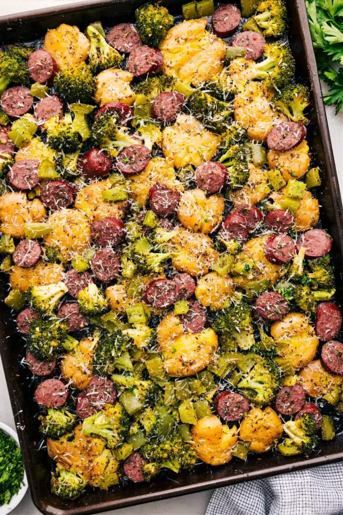 Sausage Potato Broccoli Sheet Pan with fresh parmesan on top.