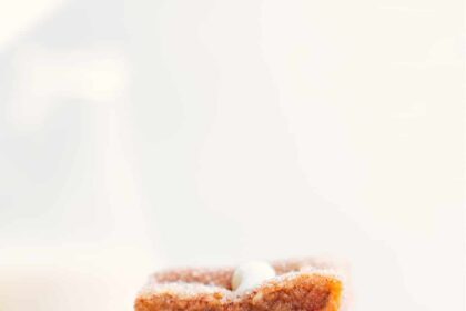 The best Snickerdoodle Blondies stacked on top of each other ready to be enjoyed.